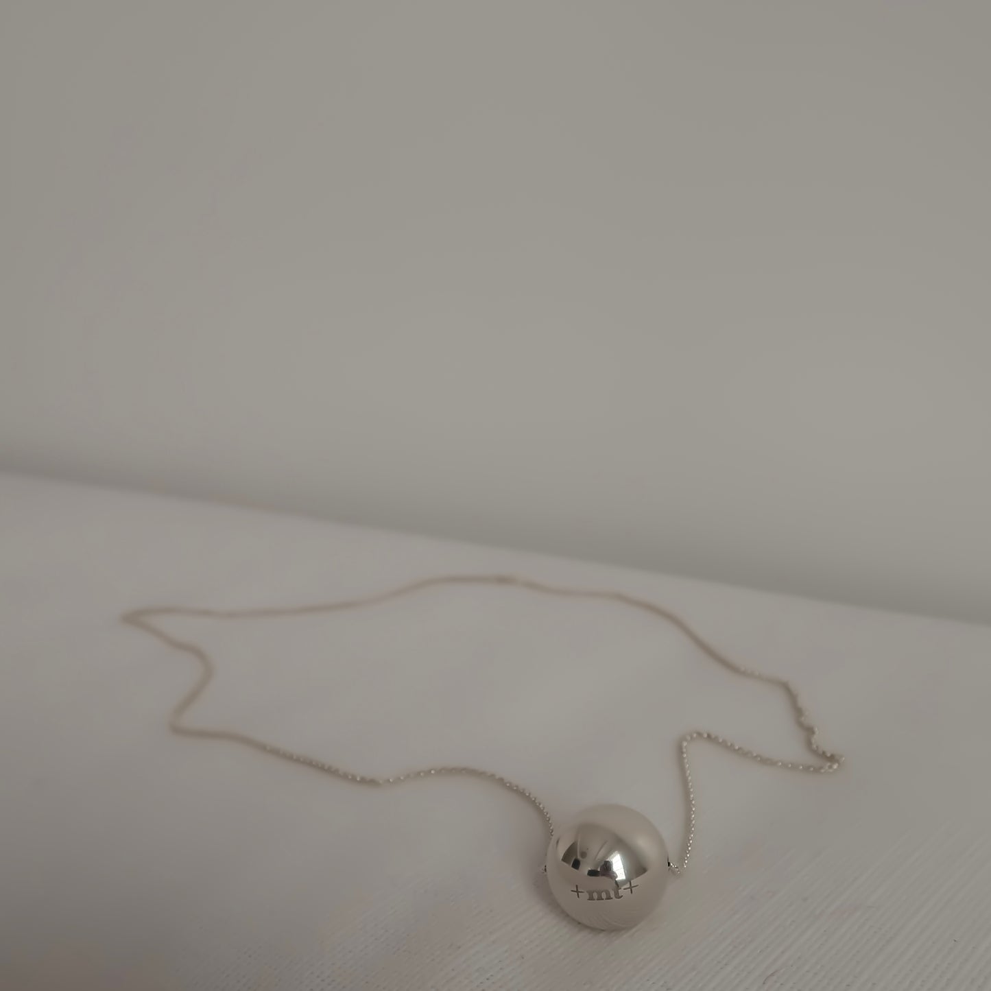 SILVER SPHERE NECKLACE
