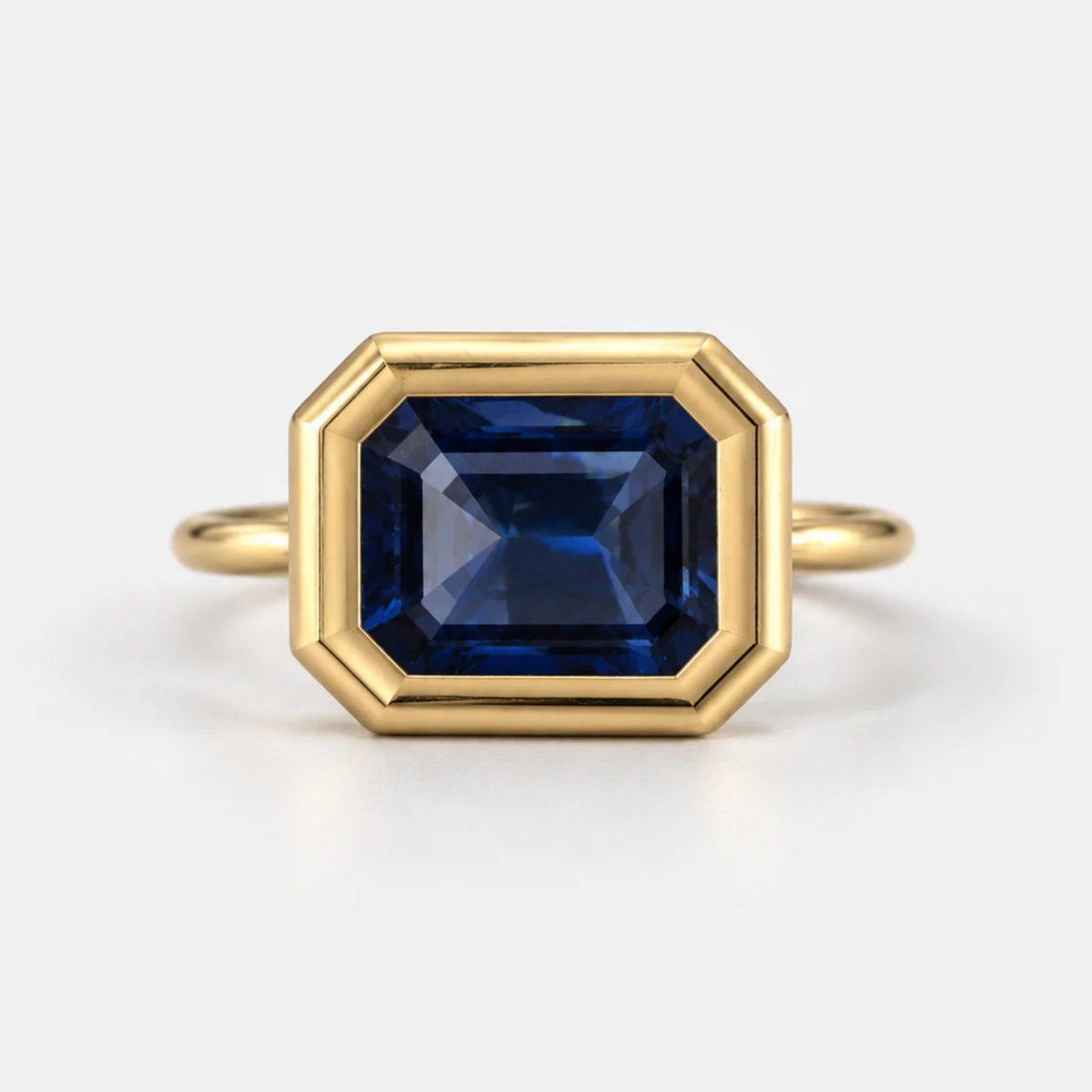 3ct East-West Double Bezel Emerald Cut Sapphire Ring