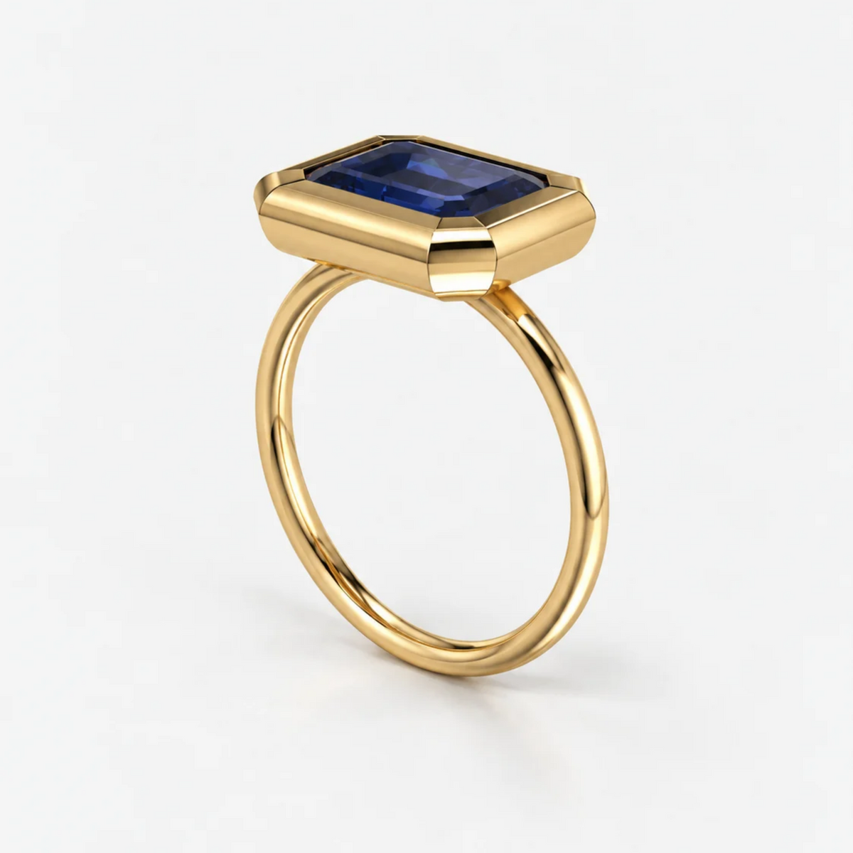 3ct East-West Double Bezel Emerald Cut Sapphire Ring